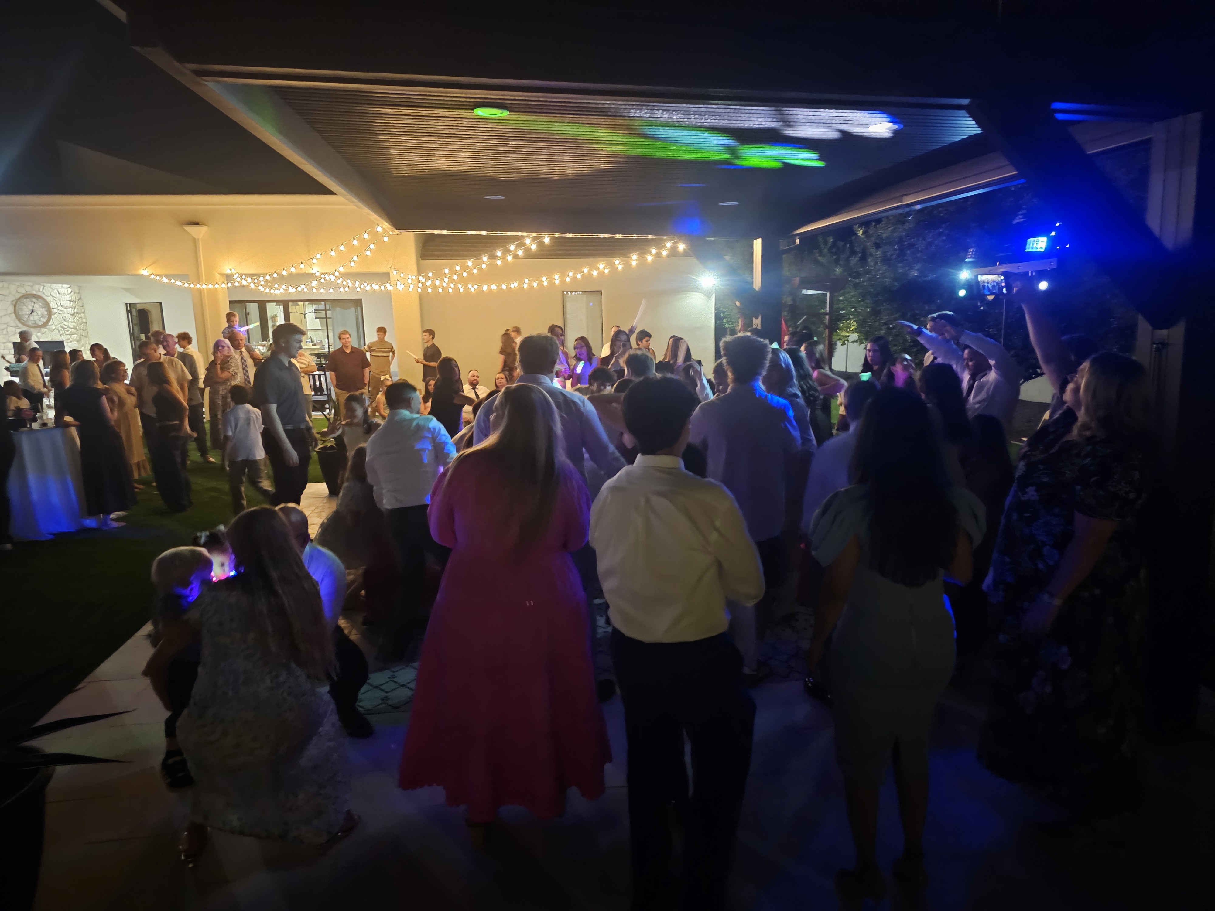 Packed outdoor dance floor at a Mesa Sound event